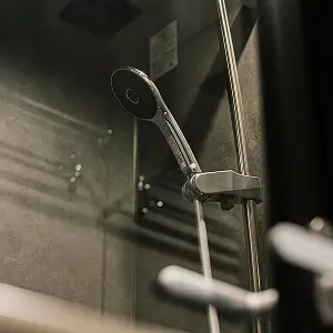 A picture of shower head of the bathroom.